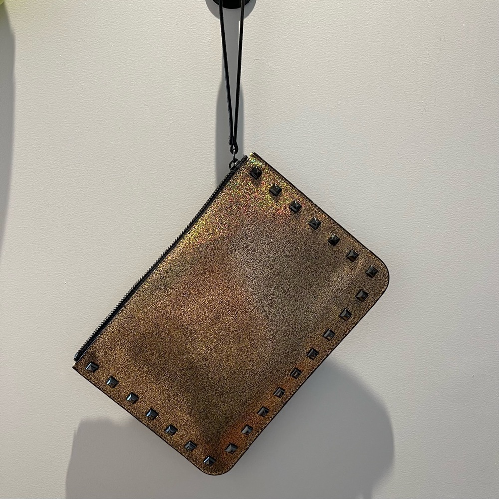 Metallic gold clutch
